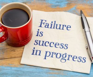 Failure is success in progress coffee mug with napkin for Famous People.
