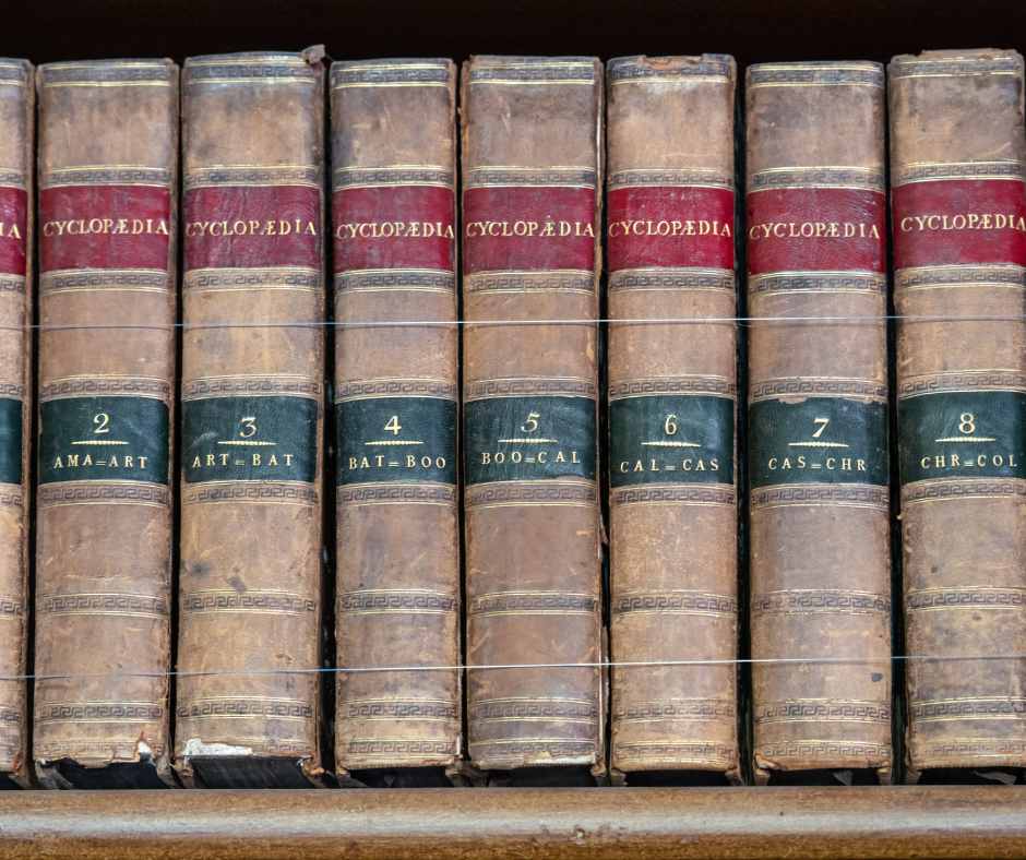 A set of encyclopedias neetly on a shelf.
