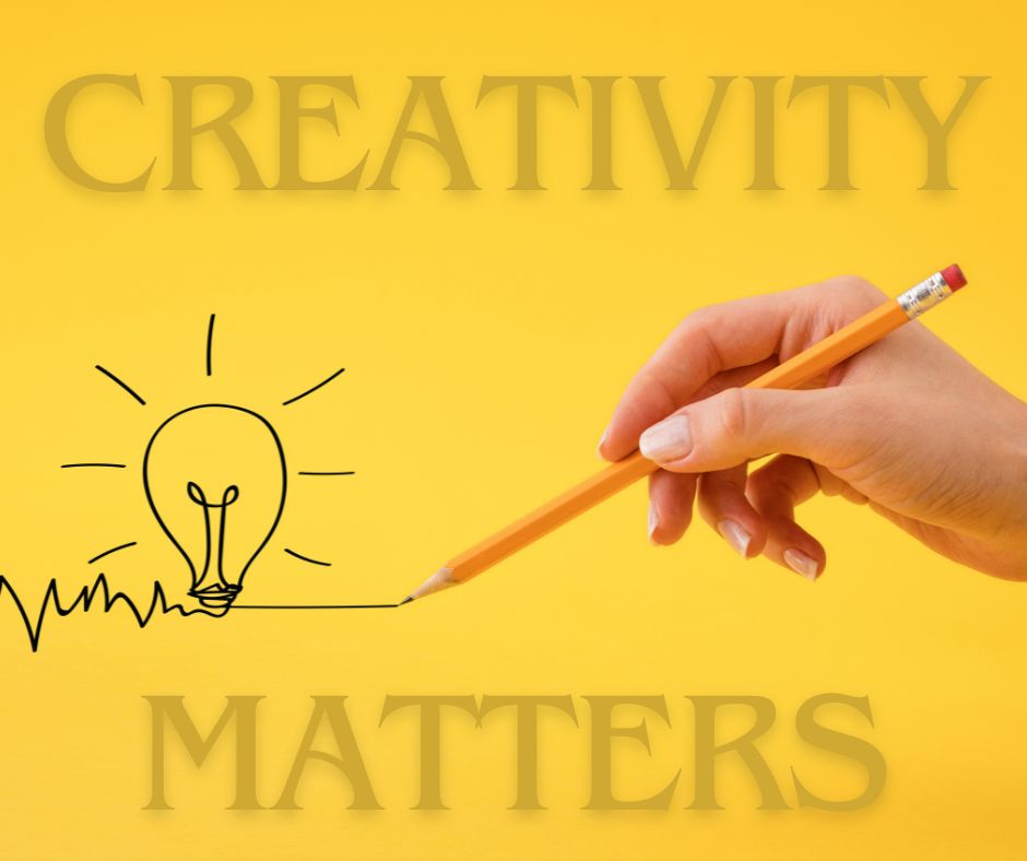 Creativity Matters image pf a hand drawing a light bulb for online innovation.