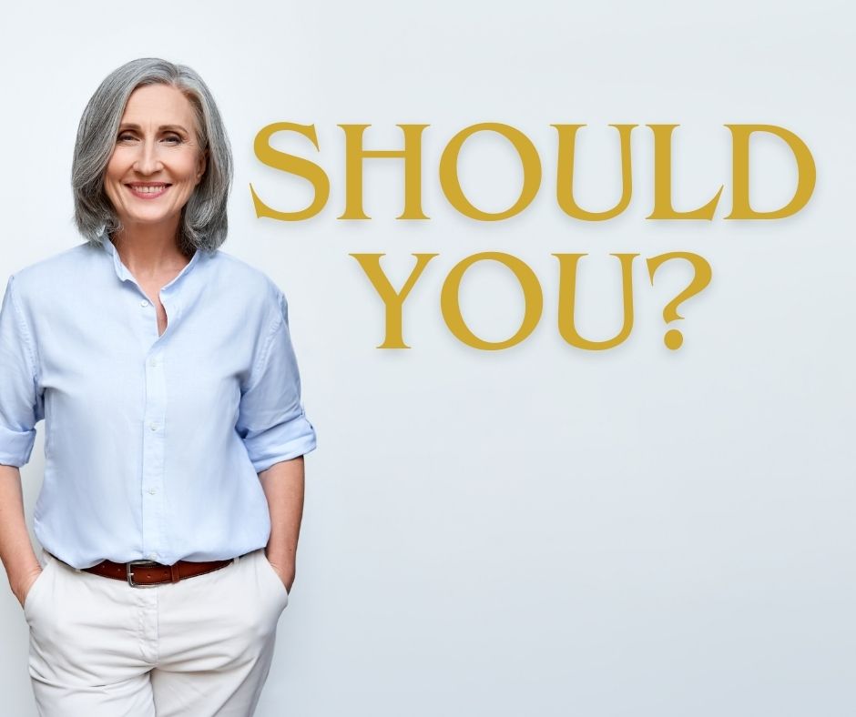 Should you reinvent yourself image of a woman in a blue shirt.