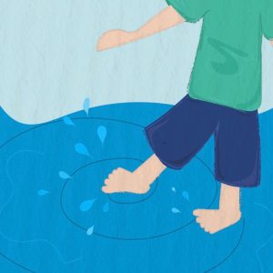 Easton's foot splashing in the water.