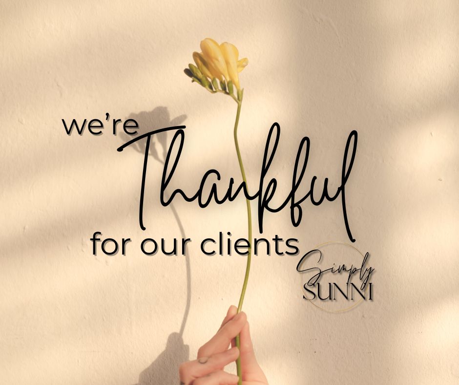 We are thankful for our clients featured image with a yellow flower.