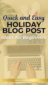 A floor and computer with Sunni laying out holiday decor, coffee, and a notebook labeled “Holiday Blog Ideas” surrounded by Christmas lights — representing seasonal blog inspiration.